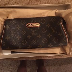 EVA clutch monogram